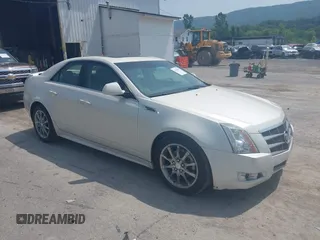 2010 Cadillac CTS Premium z VIN 1G6DS5EV0A0128983, wystawiony jako IAAI lot #42491088 z przebiegiem 202 693 mil mil oraz . Historia ofert i sprzedaży dostępna na DreamBid. Obrazek 1.