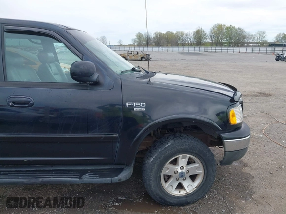 2002 Ford F-150 XLT with VIN 1FTRW08L32KD90202, listed as a IAAI auction lot 41850546 with 256,807 mi miles. Bid and sale history available at carsss.com. Image 21.