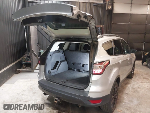 2018 Ford Escape SE z VIN 1FMCU9GD0JUD33111, wystawiony jako IAAI lot #42277404 z przebiegiem 71 896 mil mil oraz . Historia ofert i sprzedaży dostępna na DreamBid. Obrazek 4.