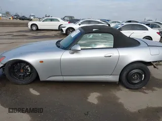 2002 Honda S2000 z VIN JHMAP11492T004927, wystawiony jako IAAI lot #42062377 z przebiegiem 117 612 mil mil oraz . Historia ofert i sprzedaży dostępna na DreamBid. Obrazek 15.