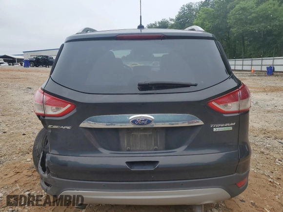 2015 Ford Escape Titanium with VIN 1FMCU0J96FUC00683, listed as a Copart auction lot 58345105 with 61,031 mi miles and Salvage title. Bid and sale history available at DreamBid. Image 6.