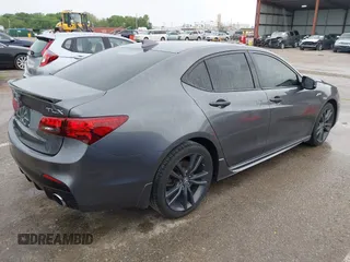 2019 Acura TLX w/A-Spec Pkg z VIN 19UUB2F61KA000932, wystawiony jako IAAI lot #42164064 z przebiegiem 79 080 mil mil oraz . Historia ofert i sprzedaży dostępna na DreamBid. Obrazek 4.