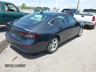 2023 Honda Accord Sedan LX with VIN 1HGCY1F28PA004601, listed as a IAAI auction lot 42031327 with 48,996 mi miles. Bid and sale history available at carsss.com. Image 4.