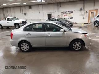 2011 Hyundai Accent GLS z VIN KMHCN4AC1BU605828, wystawiony jako IAAI lot #42129829 z przebiegiem 154 224 mil mil oraz . Historia ofert i sprzedaży dostępna na DreamBid. Obrazek 13.