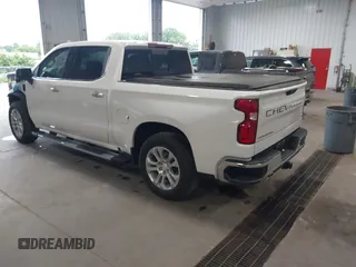 2023 Chevrolet Silverado 1500 LTZ with VIN 1GCUDGEDXPZ100414, listed as a IAAI auction lot 40005559 with 40,000 mi miles and . Bid and sale history available at DreamBid. Image 3.
