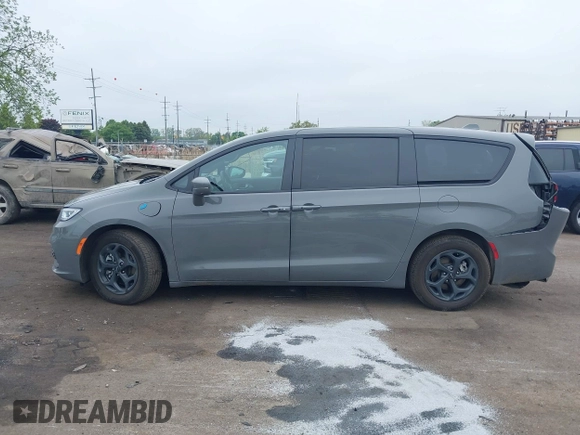 2022 Chrysler Pacifica Hybrid Limited with VIN 2C4RC1S74NR212475, listed as a IAAI auction lot 42264228 with 48,839 mi miles and . Bid and sale history available at DreamBid. Image 14.