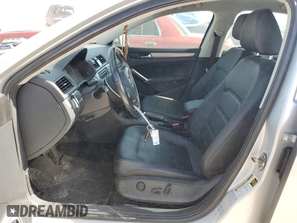 2015 Volkswagen Passat Wolfsburg Edition with VIN 1VWAS7A36FC110135, listed as a Copart auction lot 61097945 with 111,284 mi miles and Salvage title. Bid and sale history available at DreamBid. Image 7.