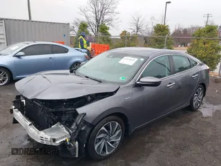 2020 Honda Insight Touring with VIN 19XZE4F98LE011149, listed as a IAAI auction lot 41834043 with 54,251 mi miles and . Bid and sale history available at carsss.com. Image 2.