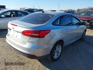 2015 Ford Focus SE with VIN 1FADP3F20FL355058, listed as a IAAI auction lot 41666337 with 144,887 mi miles. Bid and sale history available at carsss.com. Image 4.