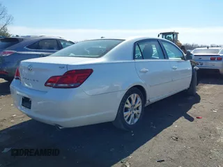 2010 Toyota Avalon XL with VIN 4T1BK3DB1AU359007, listed as a IAAI auction lot 41683221 with 70,020 mi miles and . Bid and sale history available at carsss.com. Image 4.
