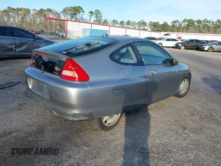 2000 Honda Insight z VIN JHMZE1354YT004101, wystawiony jako IAAI lot #41377318 z przebiegiem 231 466 mil mil oraz . Historia ofert i sprzedaży dostępna na DreamBid. Obrazek 4.
