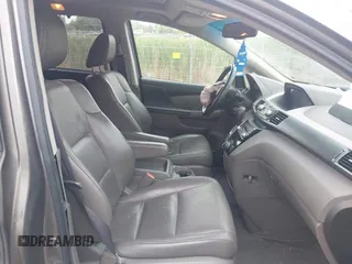 2011 Honda Odyssey EX-L with VIN 5FNRL5H64BB029087, listed as a IAAI auction lot 42508764 with 214,705 mi miles and . Bid and sale history available at DreamBid. Image 5.