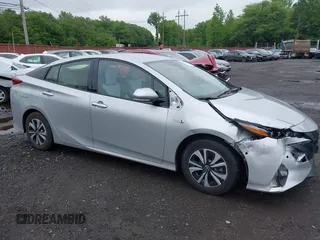 2017 Toyota Prius Plus z VIN JTDKARFPXH3034892, wystawiony jako IAAI lot #42376800 z przebiegiem 65 548 mil mil oraz . Historia ofert i sprzedaży dostępna na DreamBid. Obrazek 17.