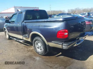 1999 Ford F-150 XL with VIN 2FTRX07L3XCA60067, listed as a IAAI auction lot 41887212 with 176,034 mi miles. Bid and sale history available at carsss.com. Image 3.