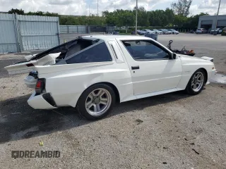 1988 Chrysler Conquest z VIN JJ3CC54N7JZ039025, wystawiony jako Copart lot #66072584 z przebiegiem 79 407 mil mil oraz Szkody całkowita. Historia ofert i sprzedaży dostępna na DreamBid. Obrazek 3.