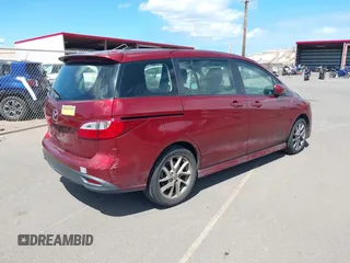 2012 Mazda 5 Touring with VIN JM1CW2CLXC0113181, listed as a IAAI auction lot 42653061 with 94,441 mi miles and . Bid and sale history available at DreamBid. Image 4.