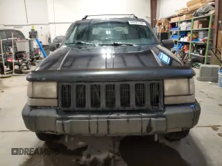 1998 Jeep Grand Cherokee Laredo with VIN 1J4GZ58Y9WC122076, listed as a Copart auction lot 84221784 with 387,353 mi miles and Salvage Title. Bid and sale history available at carsss.com. Image 5.