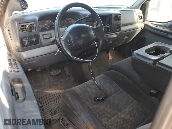 2002 Ford F-250 XL with VIN 1FTNW20F12EA44390, listed as a Copart auction lot 83888084 with 285,250 mi miles and Salvage Title. Bid and sale history available at DreamBid. Image 8.