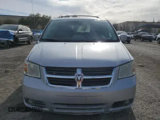 2009 Dodge Grand Caravan SXT z VIN 2D8HN54159R620187, wystawiony jako Copart lot #84703224 z przebiegiem 206 240 mil mil oraz Szkoda całkowita • Salvage title. Historia ofert i sprzedaży dostępna na DreamBid. Obrazek 5.