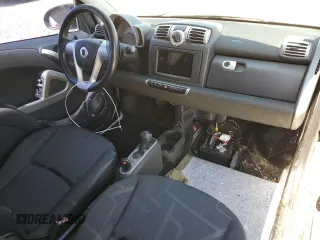 2009 Smart fortwo Pure with VIN WMEEJ31X49K224990, listed as a Copart auction lot 52111335 with 72,317 mi miles and Salvage Title. Bid and sale history available at carsss.com. Image 8.