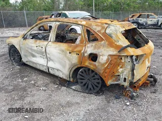 2020 Ford Escape Titanium z VIN 1FMCU9J92LUB90492, wystawiony jako IAAI lot #42243861 z przebiegiem 60 001 mil mil oraz . Historia ofert i sprzedaży dostępna na DreamBid. Obrazek 3.