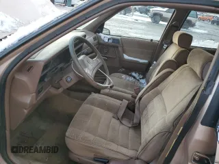 1989 Plymouth Acclaim z VIN 1P3BA46K6KF514487, wystawiony jako Copart lot #86534244 z przebiegiem 90 135 mil mil oraz Szkody całkowita. Historia ofert i sprzedaży dostępna na DreamBid. Obrazek 7.