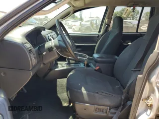 2003 Jeep Grand Cherokee Laredo with VIN 1J4GX48S13C542020, listed as a Copart auction lot 59216755 with 155,344 mi miles and Salvage title. Bid and sale history available at DreamBid. Image 7.