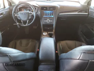 2020 Ford Fusion Titanium with VIN 3FA6P0D94LR191852, listed as a Copart auction lot 56948825 with 116,138 mi miles and Salvage title. Bid and sale history available at DreamBid. Image 8.