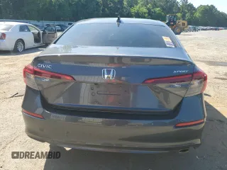 2022 Honda Civic Sport z VIN 2HGFE2F53NH589284, wystawiony jako Copart lot #56159485 z przebiegiem 126 636 mil mil oraz Szkoda całkowita • Salvage title. Historia ofert i sprzedaży dostępna na DreamBid. Obrazek 6.