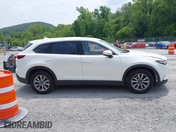 2016 Mazda CX-9 Touring с VIN JM3TCBCY1G0116889, выставлен на аукционе IAAI как лот 42394821 с пробегом 210 861 миль миль и . История ставок и продаж доступна на DreamBid. Изображение 13.