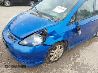 2007 Honda Fit Sport z VIN JHMGD38697S066329, wystawiony jako IAAI lot #42312163 z przebiegiem 174 935 mil mil oraz . Historia ofert i sprzedaży dostępna na DreamBid. Obrazek 6.