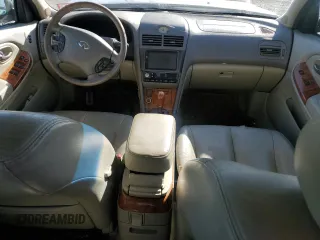 2003 Infiniti I35 Luxury z VIN JNKDA31A53T107201, wystawiony jako Copart lot #79926204 z przebiegiem Nie podano mil oraz Szkoda całkowita • Salvage title. Historia ofert i sprzedaży dostępna na DreamBid. Obrazek 8.