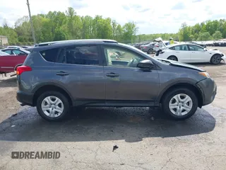 2015 Toyota RAV4 LE with VIN JTMBFREV2FD104409, listed as a IAAI auction lot 42084145 with 102,948 mi miles and . Bid and sale history available at DreamBid. Image 13.