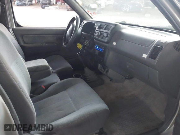 1999 Nissan Frontier XE z VIN 1N6DD26S3XC340419, wystawiony jako IAAI lot #40964630 z przebiegiem 156 431 mil mil oraz . Historia ofert i sprzedaży dostępna na DreamBid. Obrazek 5.
