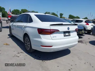 2019 Volkswagen Jetta S z VIN 3VWCB7BU9KM144272, wystawiony jako IAAI lot #41997518 z przebiegiem 91 950 mil mil oraz . Historia ofert i sprzedaży dostępna na DreamBid. Obrazek 3.