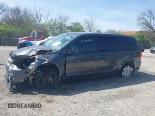 2017 Dodge Grand Caravan SE z VIN 2C4RDGBG1HR725915, wystawiony jako IAAI lot #42070982 z przebiegiem 134 659 mil mil oraz . Historia ofert i sprzedaży dostępna na DreamBid. Obrazek 14.