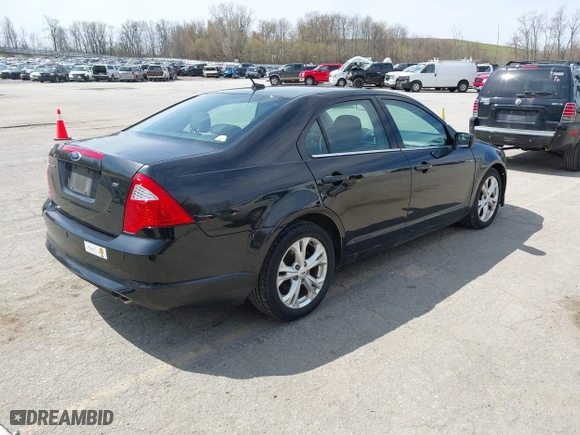 2012 Ford Fusion SE with VIN 3FAHP0HA8CR276237, listed as a IAAI auction lot 42048715 with 1,799,668 mi miles. Bid and sale history available at carsss.com. Image 4.