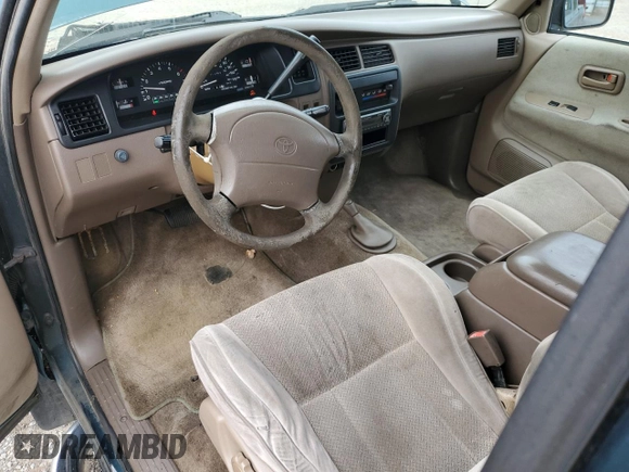 1997 Toyota T100 SR5 with VIN JT4UN24DXV0048933, listed as a Copart auction lot 79479214 with 311,763 mi miles and Clean Title. Bid and sale history available at DreamBid. Image 8.