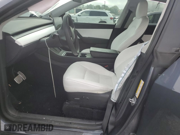 2022 Tesla Model Y Performance with VIN 7SAYGDEF7NF507184, listed as a Copart auction lot 58329875 with 98,320 mi miles and Salvage title. Bid and sale history available at DreamBid. Image 7.