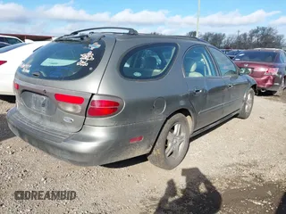 2002 Ford Taurus z VIN 1FAHP59SX2G137396, wystawiony jako IAAI lot #41661425 z przebiegiem 155 789 mil mil oraz . Historia ofert i sprzedaży dostępna na DreamBid. Obrazek 4.