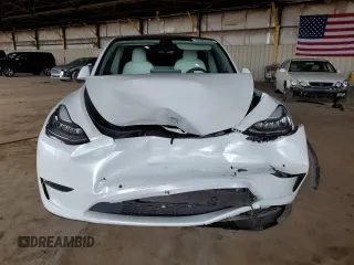 2021 Tesla Model Y Long Range with VIN 5YJYGDEE6MF075819, listed as a Copart auction lot 50903425 with 67,857 mi miles and Salvage Title. Bid and sale history available at DreamBid. Image 5.