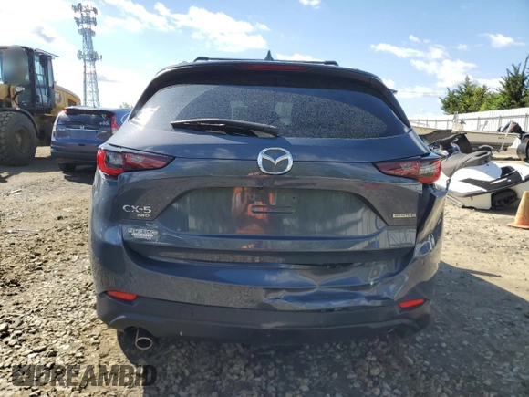 2023 Mazda CX-5 S Carbon Edition z VIN JM3KFBCM9P0110080, wystawiony jako Copart lot #55911635 z przebiegiem 20 835 mil mil oraz Szkoda całkowita • Salvage title. Historia ofert i sprzedaży dostępna na DreamBid. Obrazek 6.