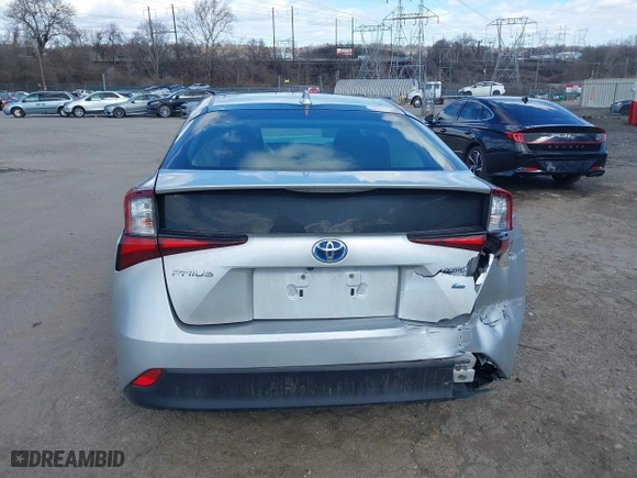 2022 Toyota Prius L Eco with VIN JTDKAMFU7N3176041, listed as a IAAI auction lot 41562977 with 61,964 mi miles. Bid and sale history available at carsss.com. Image 16.
