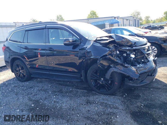 2021 Honda Pilot Special Edition with VIN 5FNYF6H26MB077053, listed as a Copart auction lot 55793135 with 83,110 mi miles and Salvage title. Bid and sale history available at DreamBid. Image 4.