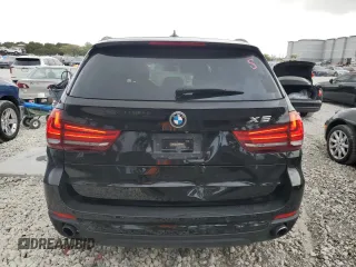 2015 BMW X5 sDrive35i with VIN 5UXKR2C57F0H37742, listed as a Copart auction lot 47573415 with 142,259 mi miles and Clean Title. Bid and sale history available at carsss.com. Image 6.