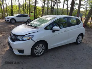 2015 Honda Fit LX with VIN 3HGGK5H50FM772396, listed as a IAAI auction lot 42112723 with 125,419 mi miles and . Bid and sale history available at carsss.com. Image 2.