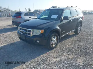 2008 Ford Escape XLT with VIN 1FMCU93138KD65438, listed as a IAAI auction lot 42073549 with 185,343 mi miles. Bid and sale history available at carsss.com. Image 2.