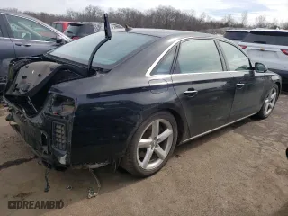 2015 Audi A8 L 4.0T with VIN WAU32AFD7FN033464, listed as a Copart auction lot 42682643 with 130,105 mi miles. Bid and sale history available at carsss.com. Image 3.