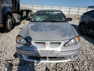 2004 Pontiac Grand Am GT with VIN 1G2NW52E64C130013, listed as a Copart auction lot 74018514 with 165,657 mi miles and Salvage Title. Bid and sale history available at carsss.com. Image 5.