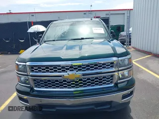 2014 Chevrolet Silverado 1500 LT with VIN 1GCRCREH2EZ323115, listed as a IAAI auction lot 42055949 with 61,337 mi miles and . Bid and sale history available at DreamBid. Image 12.